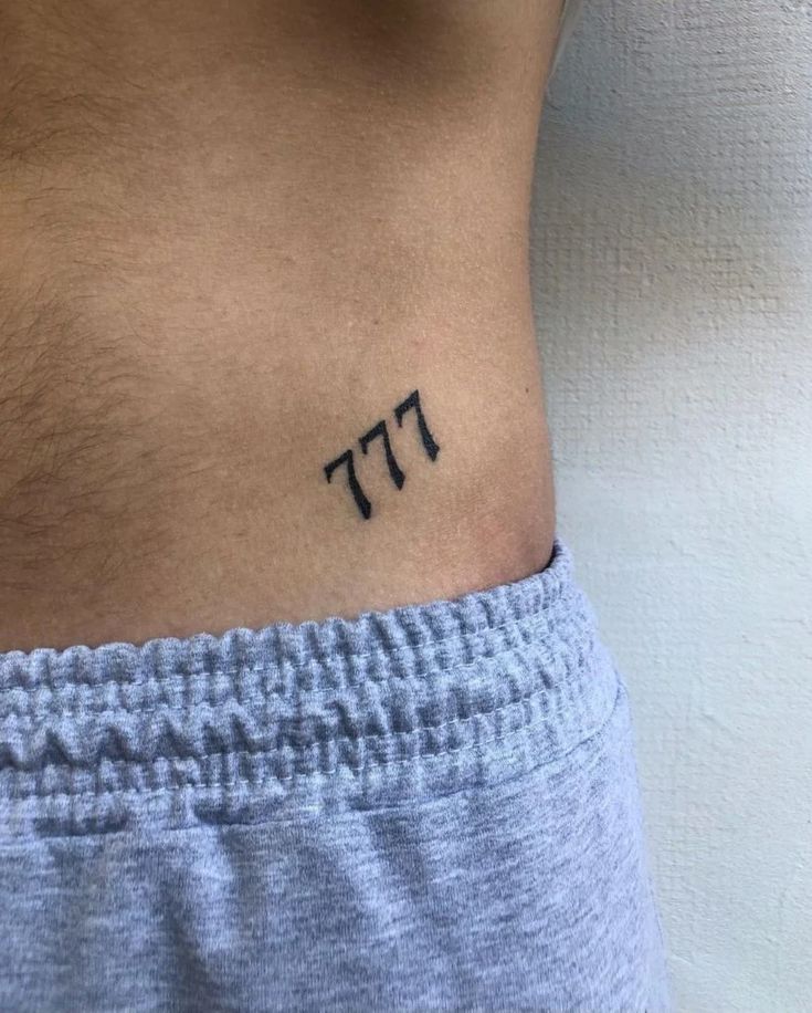 777 tattoo meaning on a woman