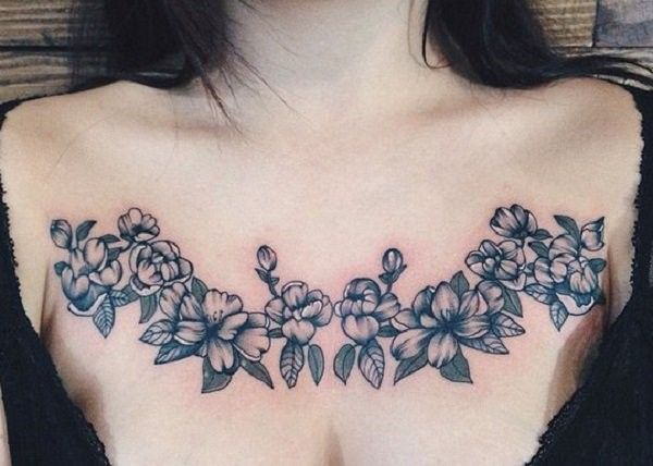 chest tattoo between breast