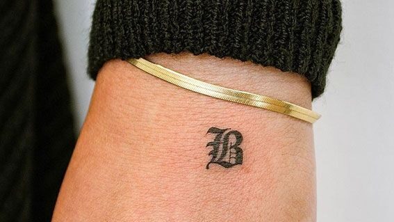 classy women's unique hand tattoos