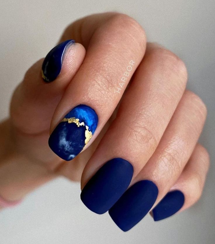 coffin blue and gold nails