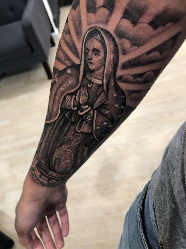 crying virgin mary tattoo