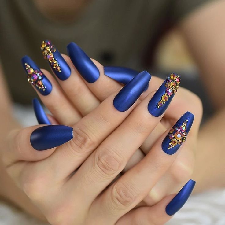 dark blue and gold nails