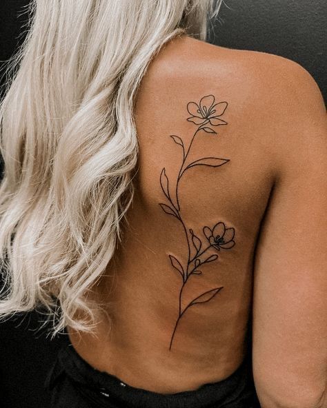 elegant back tattoos for women