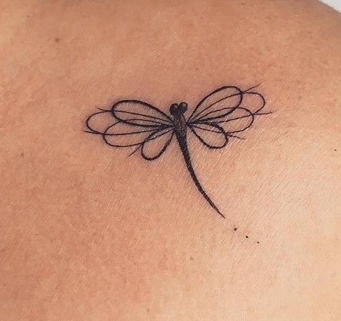 elegant dragonfly tatto