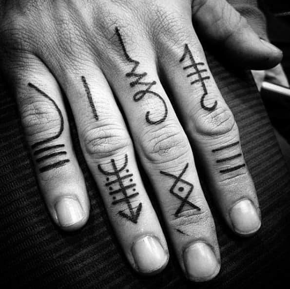 female finger tattoo ideas