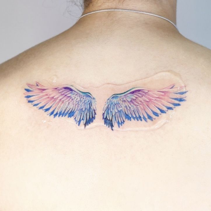 feminine guardian angel tattoo