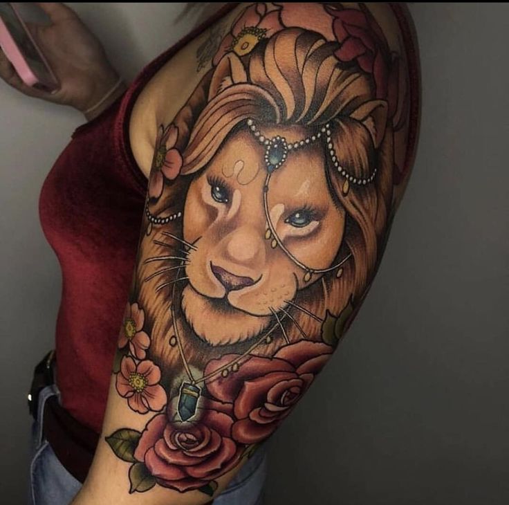 feminine lioness tattoo