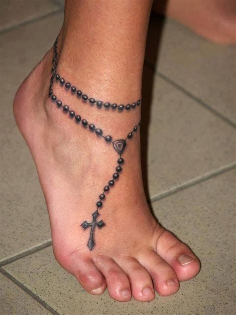 forearm rosary tattoo