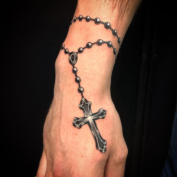 gangster rosary tattoo on hand