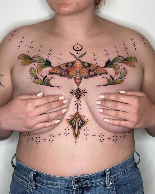 heart tattoo between breast