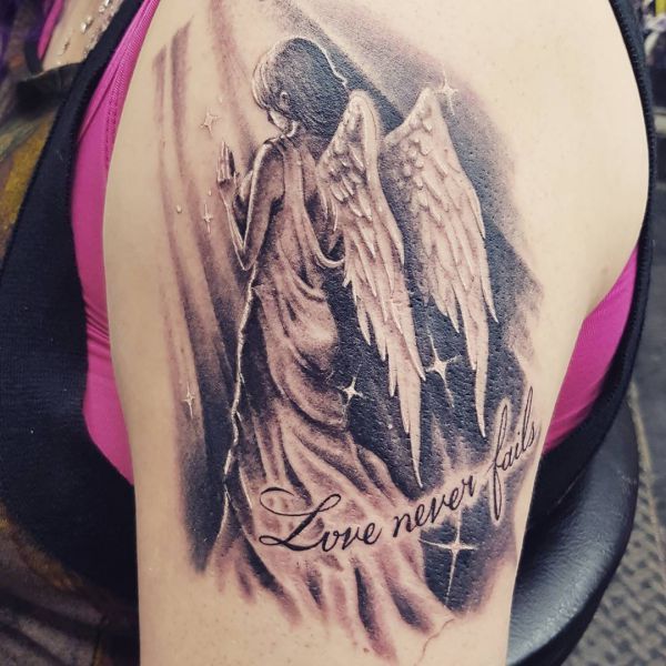 male protector guardian angel tattoo