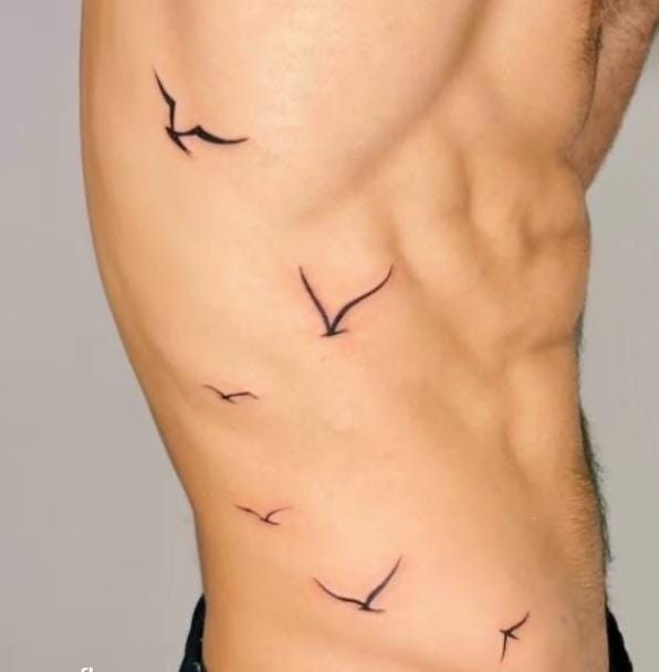 meaning unique small bird tattoos