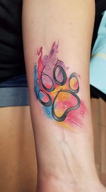 meaningful paw print tattoo