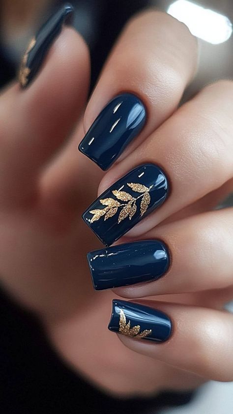 navy blue and gold nail