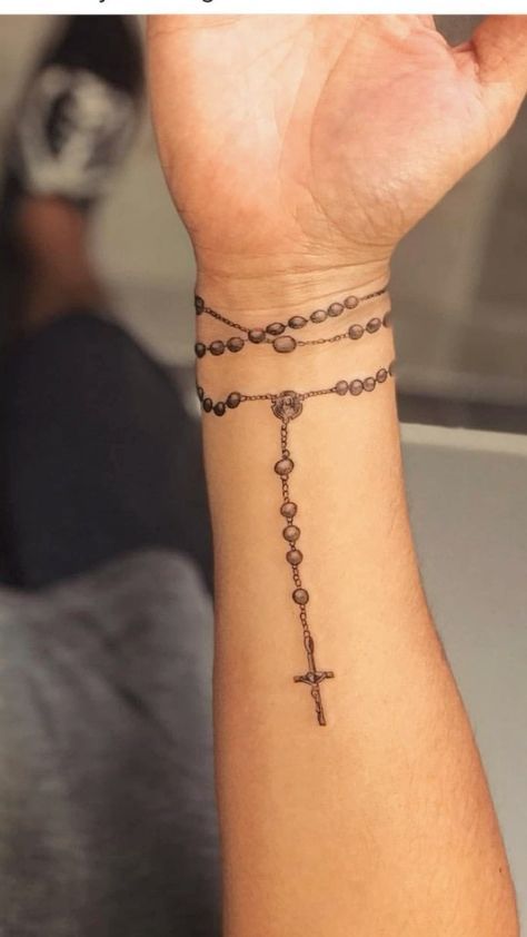 rosary tattoo on foot