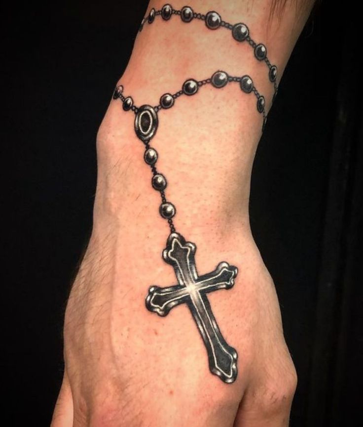 rosary tattoo on hand