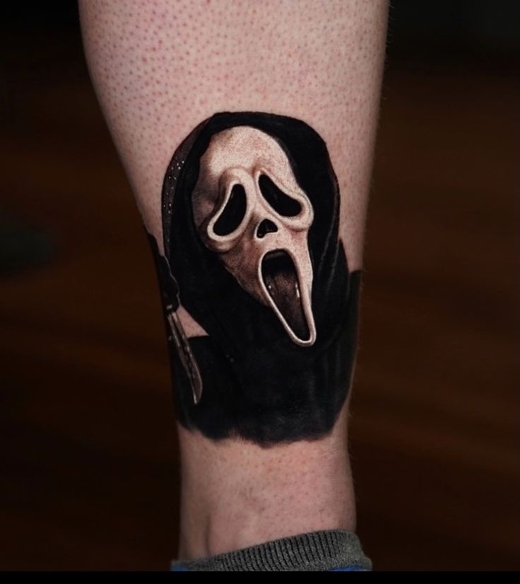 simple simple ghostface tattoo