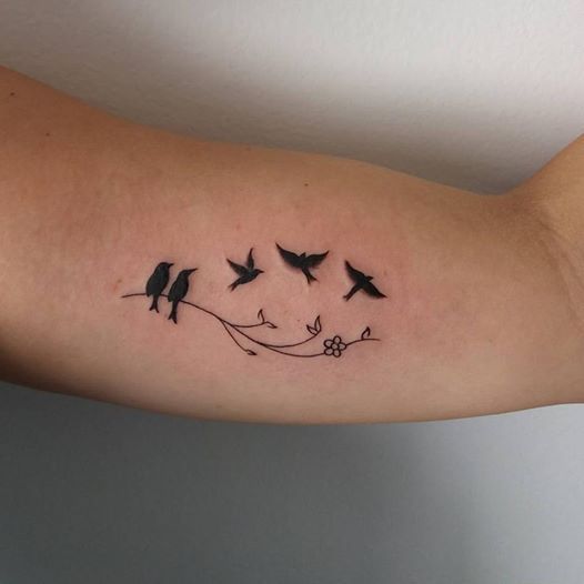 small bird tattoos on wrist