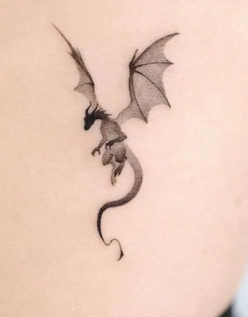 small dragon tattoos on wrist