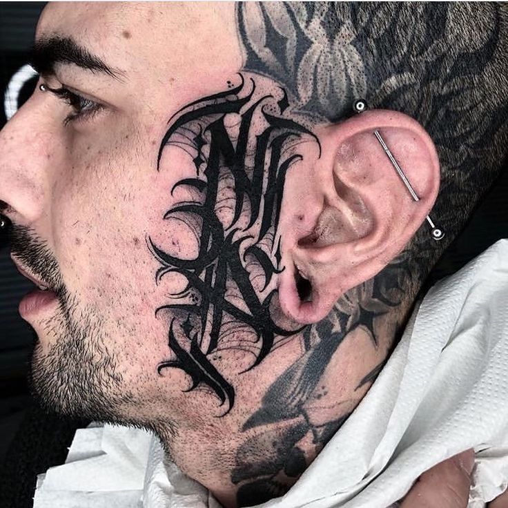 small face tattoo ideas