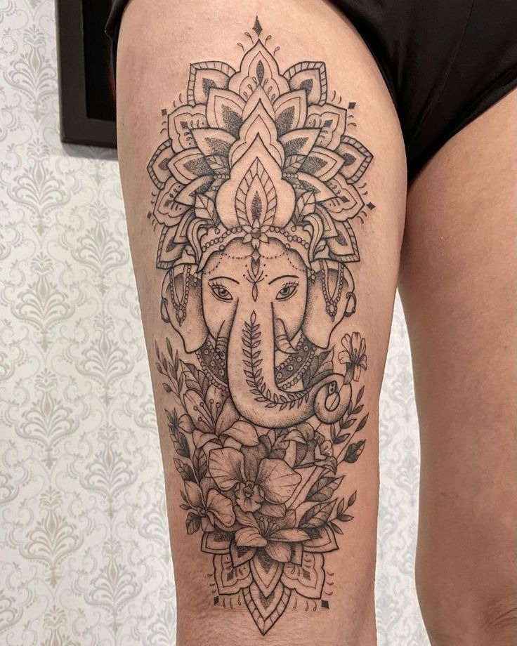 small ganesha tattoo

