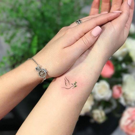 small tattoo for women wrist