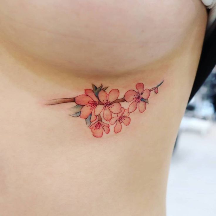 small under boob tattoo idea