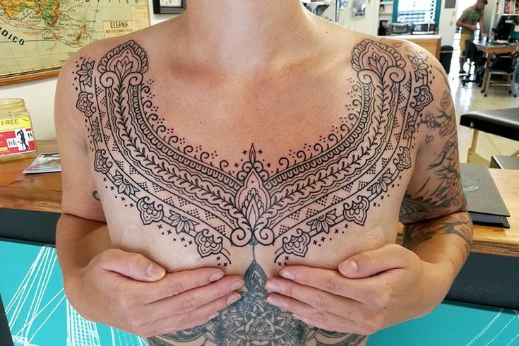 spider web tattoo breast