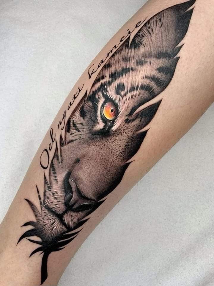 strength feminine lioness tattoo