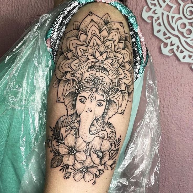 unique ganesha tattoo design

