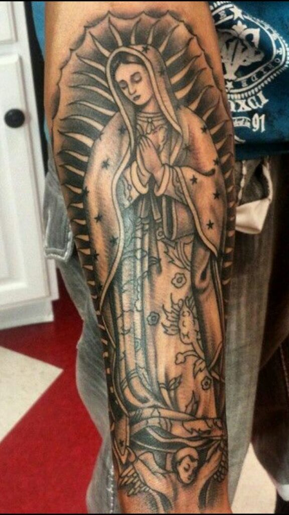 virgin mary tattoo forearm