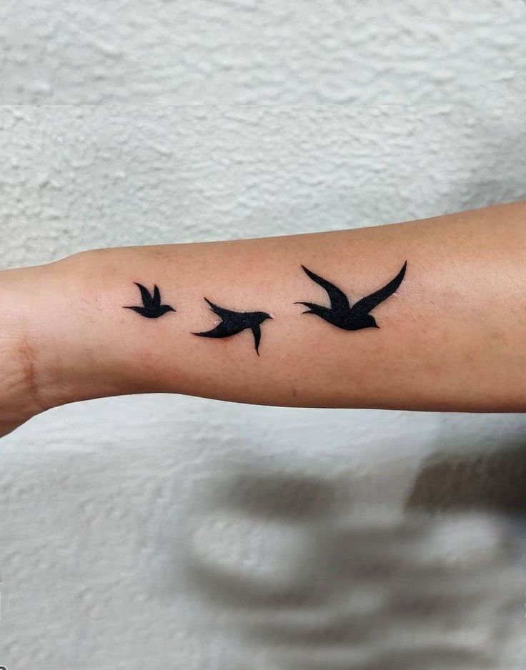 wrist meaningful small bird tattoos